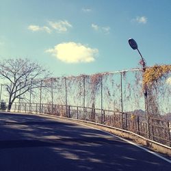 Road against cloudy sky