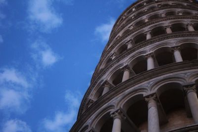 Low angle view of historical building against blue sky