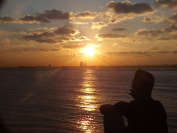 Scenic view of sea at sunset