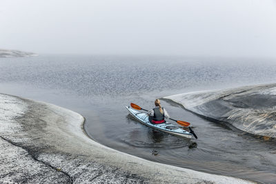 High angle view of boat in sea against sky