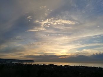 Scenic view of silhouette landscape against sky during sunset