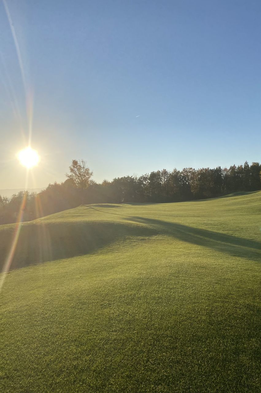 Sky Grass Plant Sunlight Beauty In Nature Scenics - Nature Nature Lens Flare Green Color Field Tranquil Scene Landscape Environment Golf Sun Tranquility Land Golf Course No People Sport