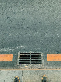 High angle view of manhole on road