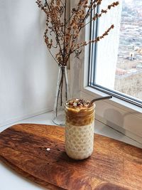 Close-up of glass of jar on table