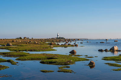 Scenic view of sea against clear sky