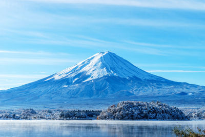 Scenic view of mountain against sky during winter