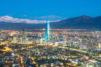 Skyline of santiago de chile at the foots of the andes mountain range and buildings at providencia.