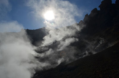 Geothermal steam rising up from the valley in hveragerdi iceland.