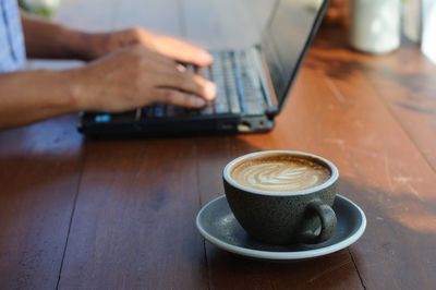 Coffee cup on table