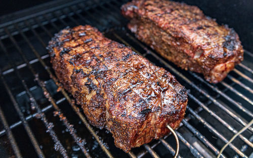 Close-up of meat on barbecue grill