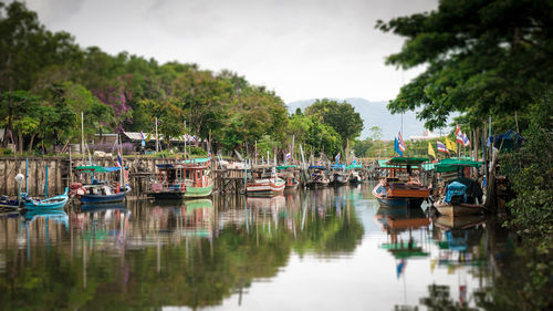 Tilt-shift blur effect. scenery of fishing boats in canal, phuket, thailand