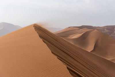 View from nature and landscapes of dasht e lut or sahara desert with wind blowing sands. 