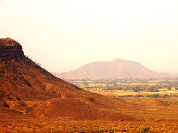 Scenic view of mountains against clear sky