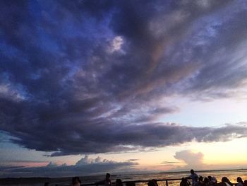 Low angle view of dramatic sky during sunset