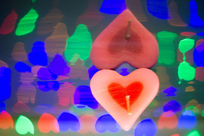 Close-up of heart shape made from multi colored lights