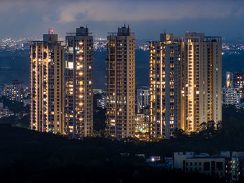 High angle view of illuminated buildings at night