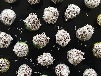 Close-up of flowers over black background