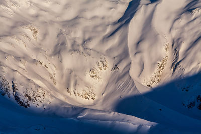 Full frame shot of snow covered land