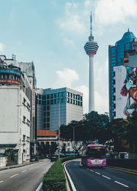 View of city against cloudy sky