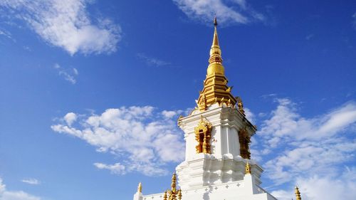 Low angle view of temple against blue sky