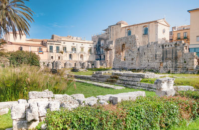 Siracusa italian city, view of the apollo temple ancient ruins in ortygia