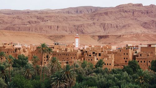 High angle view of old buildings against mountains