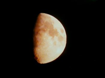 Close-up of moon against clear sky at night
