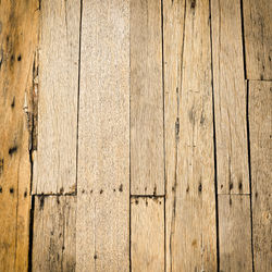 Close-up of damaged floorboard