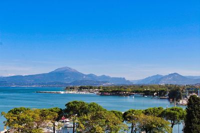 Scenic view of sea against clear blue sky