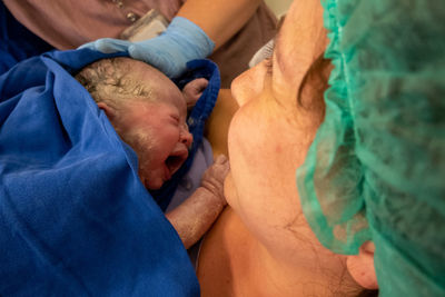 Mother daughter shortly after birth at hospital.