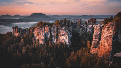 Sunrise and sunset at the bastei bridge in saxon switzerland, germany. sonnenaufgang an der bastei