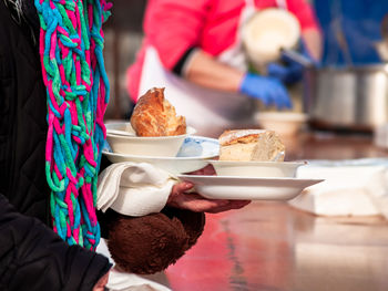 Close-up of woman holding food