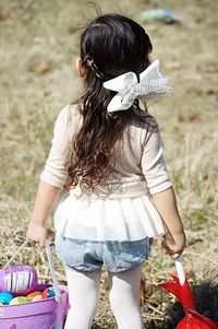 Close-up of young woman holding hands