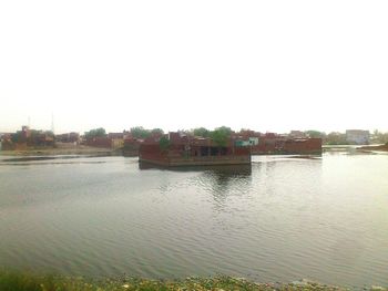 Calm sea against clear sky