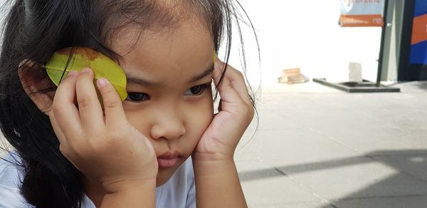 Close-up portrait of cute girl