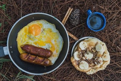 Directly above shot of breakfast on field