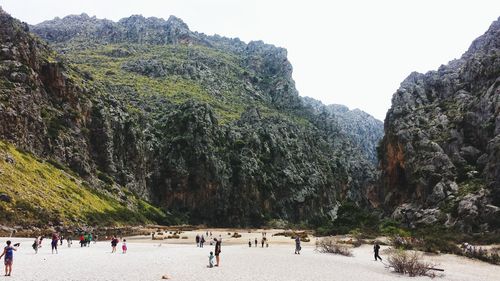 Group of people on mountain road