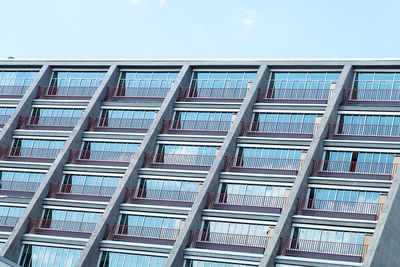 Low angle view of built structure against blue sky