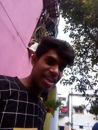 Portrait of young man smiling