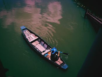 High angle view of man sailing in river 
