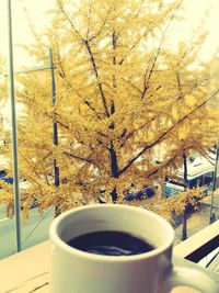 Close-up of coffee cup on table