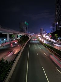 Light trails on city street at night