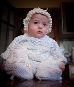 Portrait of cute baby at home
