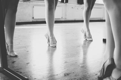 Low section of women practicing in ballet studio