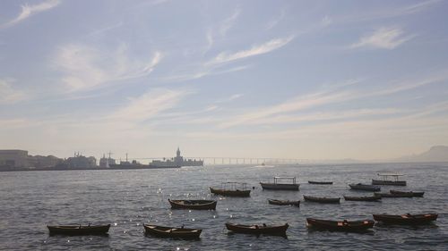 Boats moored in sea