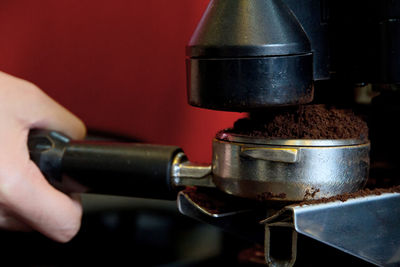 Close-up of person holding coffee pota filter
