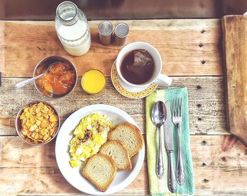 Directly above shot of breakfast on wooden table