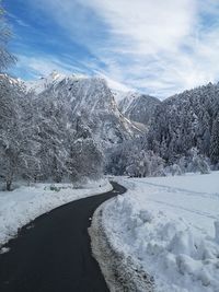 Snow covered mountain against sky