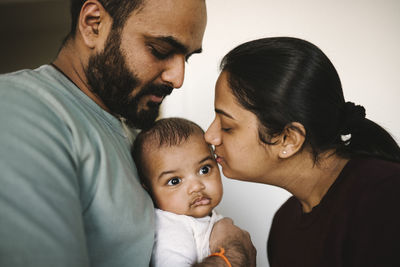 Father and mother with baby