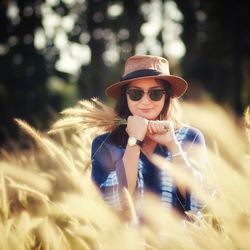 Portrait of young woman in sunglasses